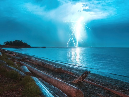 Dramatic Irish Coastline: Mesmerising Lightning Storm Over the Sea