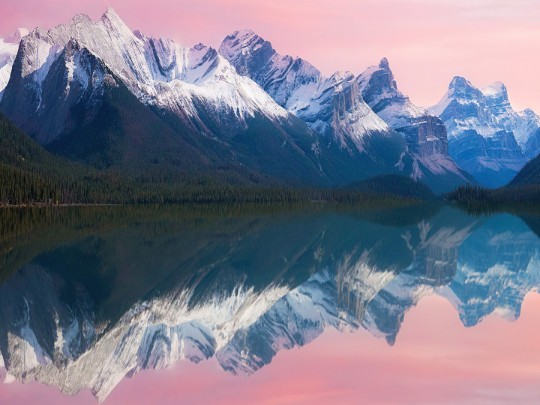Mirror to the Soul: Finding Peace in the Reflection of Snow-Capped Mountains
