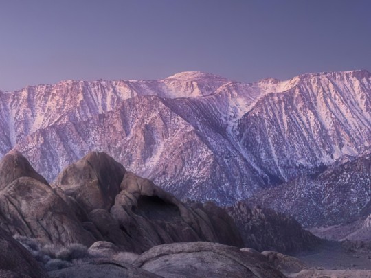 Spectacular Crescent Moon Over Snowy Peaks: An Australian Winter's Dream